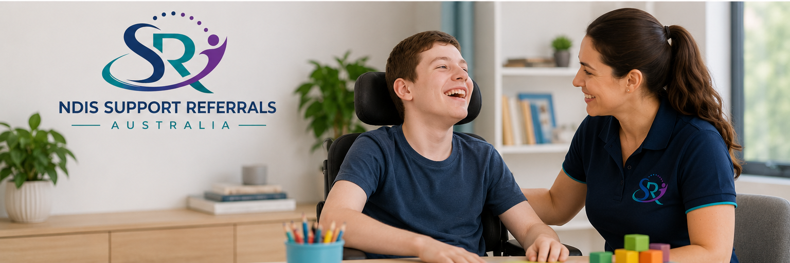 Placement officer supporting a young NDIS participant in a wheelchair